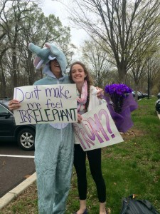 AN ELEPHANT OF A PROMPOSAL: Joe Meyer '16 asks Becca Archambault '16 to prom with an elephant costume, a poster, and a bouquet of flowers. Photo Courtesy of Nina Pagano '16