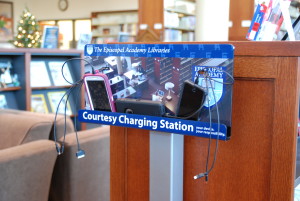 APPLE JUICE:  The library has recently placed three new charging stations for Macbook airs and iPhones Photo Courtesy of Jenna Cooley '16