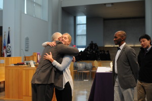 GAVIN GREETS UPPER SCHOOL: Chaplain elect Reverend Tim Gavin hugs Grace Norley, member of the Upper School Vestry. Photo Courtesy of Michael Leslie 