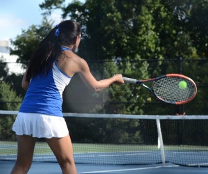 FABULOUS FOREHAND: Mckenzie Lee ‘19, junior on the Girls’ Varsity Tennis Team, uses excellent form to strike the ball. Photo Courtesy of Alex Conroy ‘19