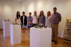 MAGICAL EXPERIENCE: Episcopal students and faculty stand proudly behind their own Raku art pieces. Photo courtesy of Episcopal Academy websit