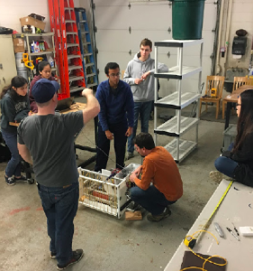 BUILDING BOTS: Last year’s Episcopal Robotics Team constructs a robot to compete in regional and national competitions. Photo Courtesy of Amy Chen ‘19